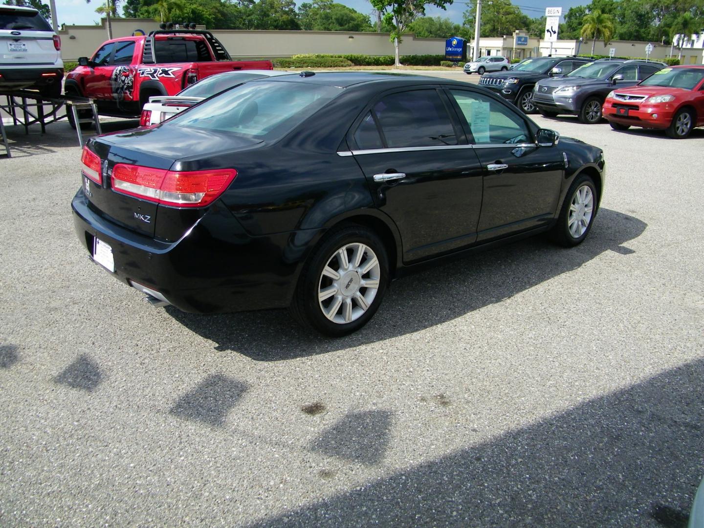 2011 Black /Black Lincoln MKZ FWD (3LNHL2GC0BR) with an 3.5L V6 DOHC 24V engine, 6-Speed Automatic transmission, located at 4000 Bee Ridge Road, Sarasota, FL, 34233, (941) 926-0300, 27.298664, -82.489151 - Photo#6